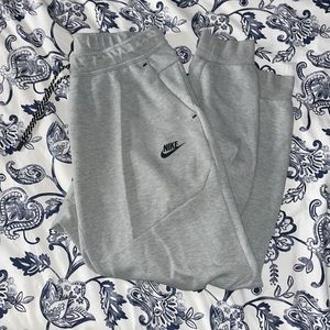 Gray Nike tech sweatpants